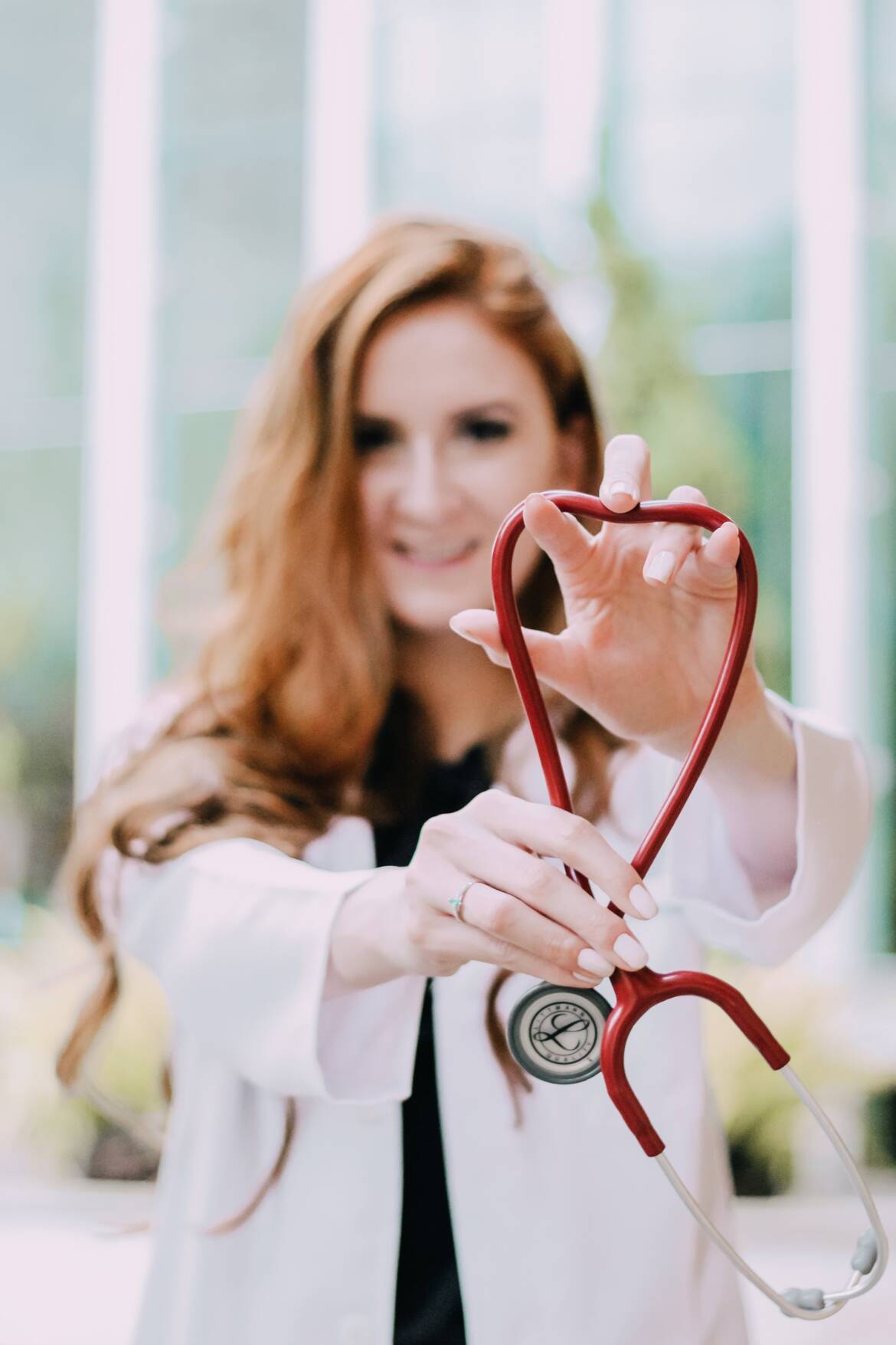 photo-of-woman-holding-red-stethoscope-3408368.jpg
